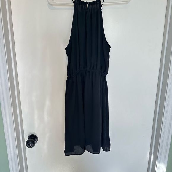 Black flowy dress with spaghetti straps. - Picture 2 of 4